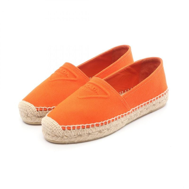 Prada Slip-ons Embossed Logo Canvas