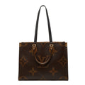 Louis Vuitton Monogram Giant Reverse On The Go MM Shoulder Bag