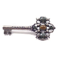Chanel Key Motif Brooch Silver Color Rice Stone