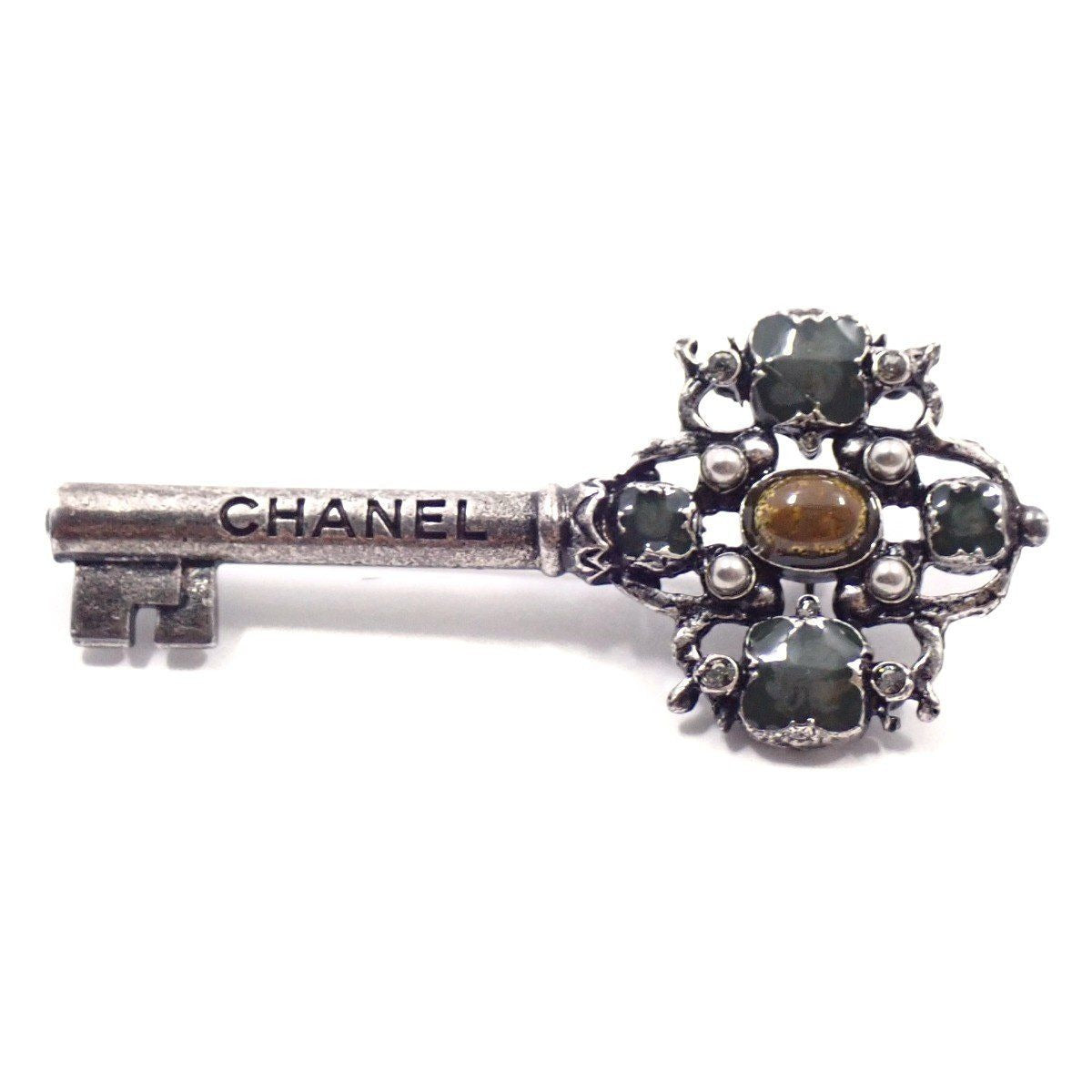 Chanel Key Motif Brooch Silver Color Rice Stone
