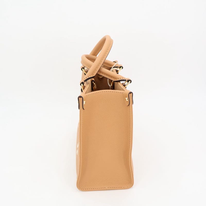 Louis Vuitton Monogram Empreinte On The Go PM 2-Way Arizona Leather — view 9