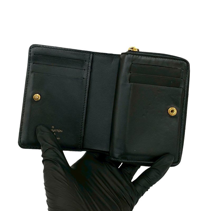 Louis Vuitton Portefeuille Monogram Empreinte Leather Round Zip Bifold Wallet — view 7