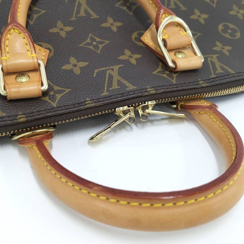 Louis Vuitton Alma Monogram Handbag — view 8