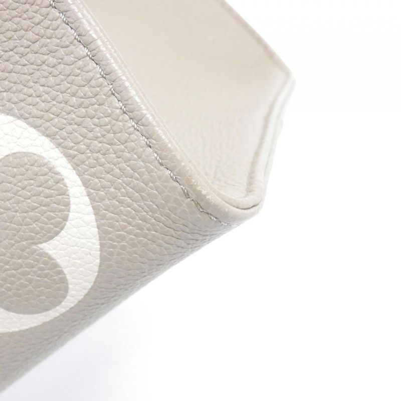 Louis Vuitton Bicolor Monogram Empreinte On The Go MM Bag — view 3
