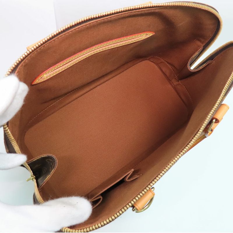 Louis Vuitton Alma Monogram Handbag Brown — view 6