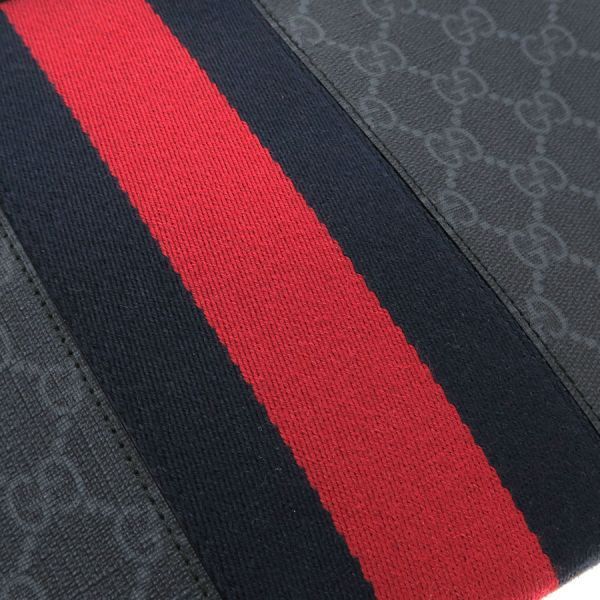 Gucci GG Supreme Clutch Bag — view 6