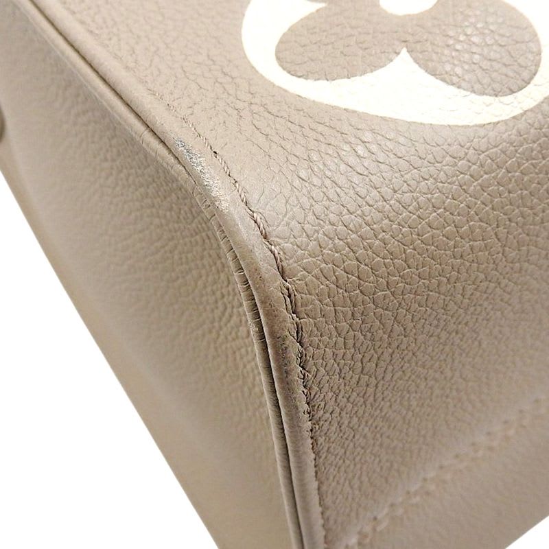 Louis Vuitton Monogram Empreinte On The Go MM Tote Bag — view 3