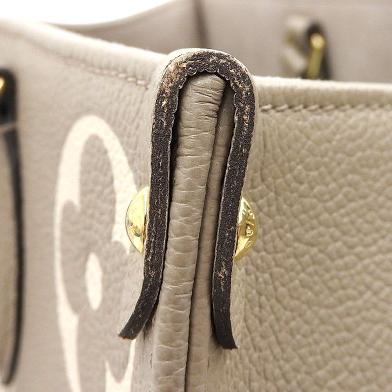 Louis Vuitton Monogram Empreinte On The Go MM Tote Bag — view 4