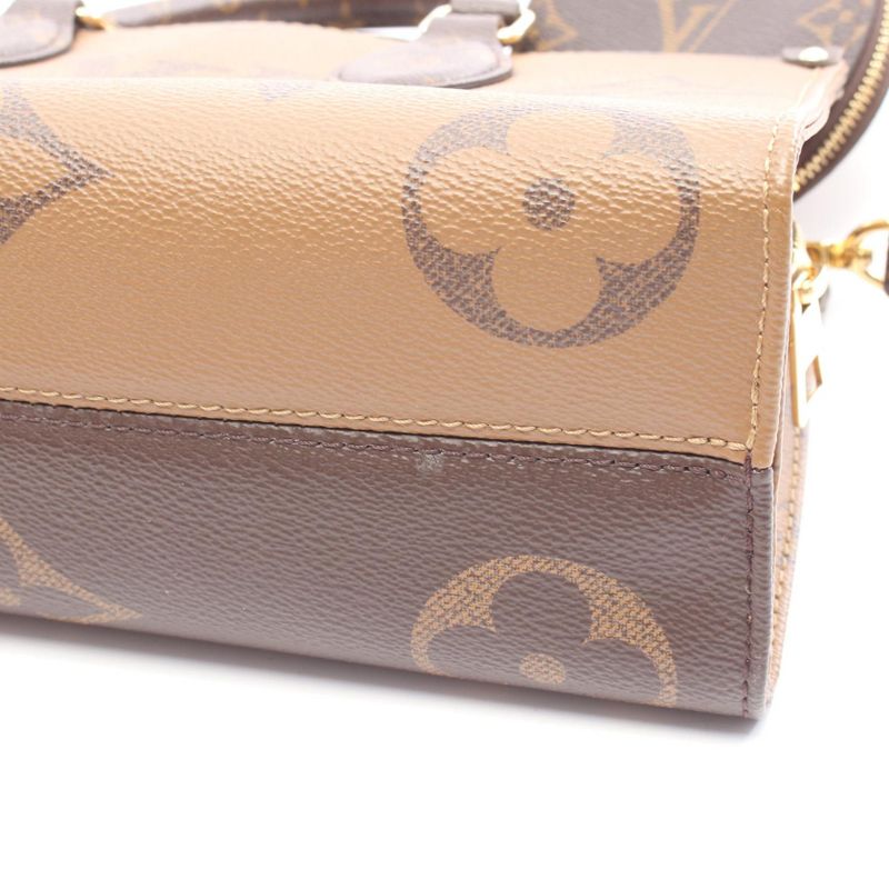 Louis Vuitton Handbag On The Go EW Monogram Giant Reverse — view 7