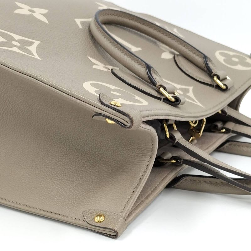 Louis Vuitton On The Go MM 2-Way Handbag Bicolor Monogram Empreinte Tourterelle