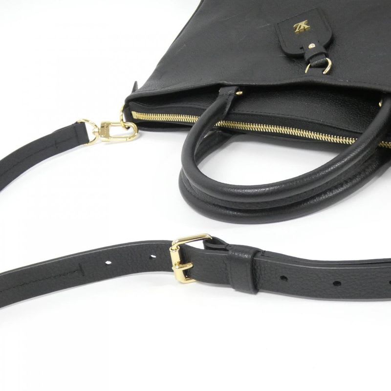Louis Vuitton Monogram Empreinte Trianon MM Bag — view 8