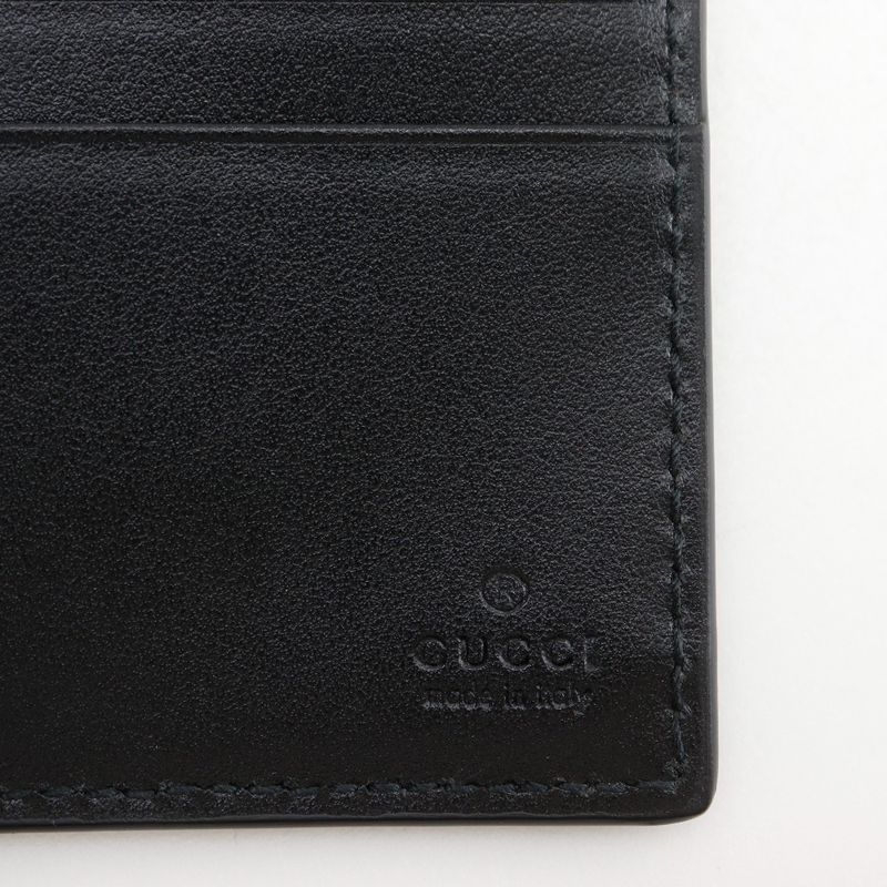 Gucci GG Embossed Bifold Cuff Black Billfold — view 8