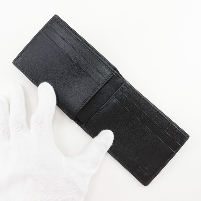 Gucci GG Embossed Bifold Cuff Black Billfold — view 6