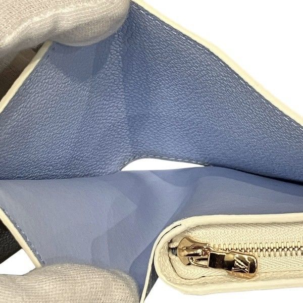 Louis Vuitton Monogram Empreinte Portefeuille Clair Bifold Wallet — view 6