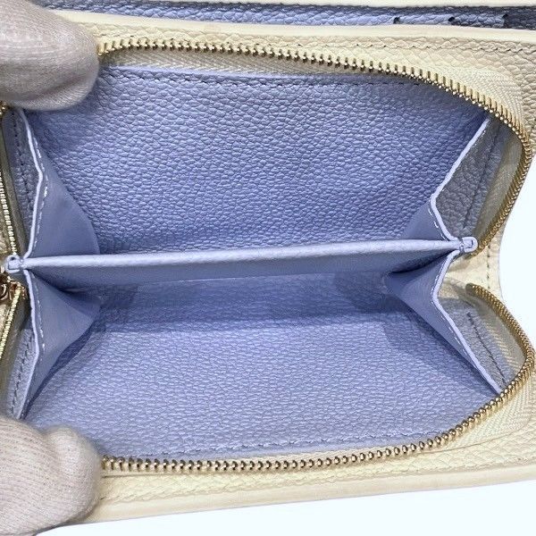 Louis Vuitton Monogram Empreinte Portefeuille Clair Bifold Wallet — view 8
