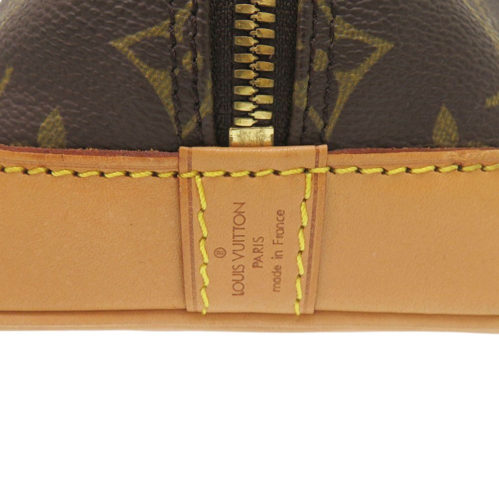 Louis Vuitton Alma Monogram Handbag — view 9