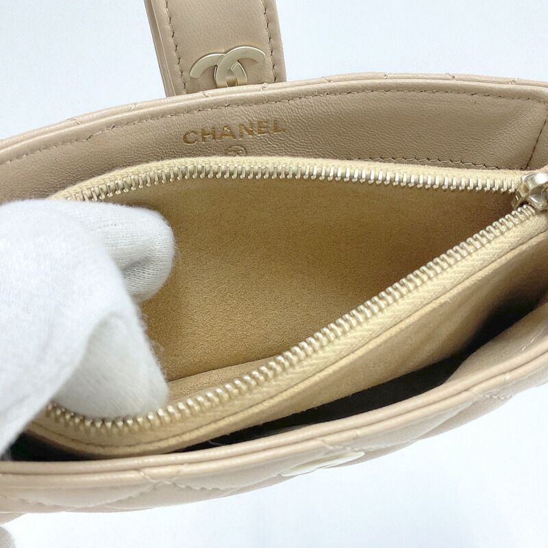 Chanel Quilted Mini Pouch Handbag Lambskin Beige Gold — view 6