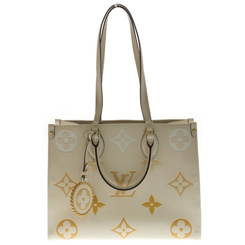 Louis Vuitton Monogram Empreinte on the Go MM Handbag Leather