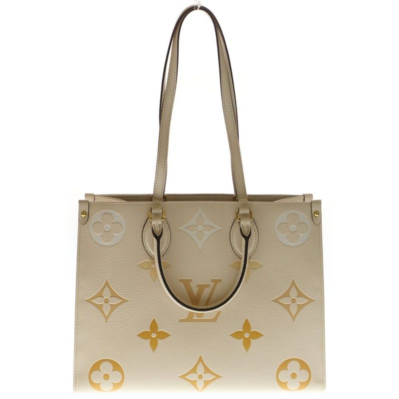 Louis Vuitton Monogram Empreinte on the Go MM Handbag Leather