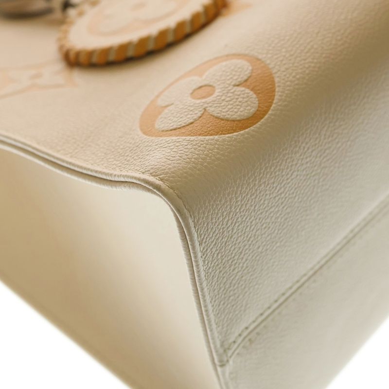 Louis Vuitton Monogram Empreinte on the Go MM Handbag Leather