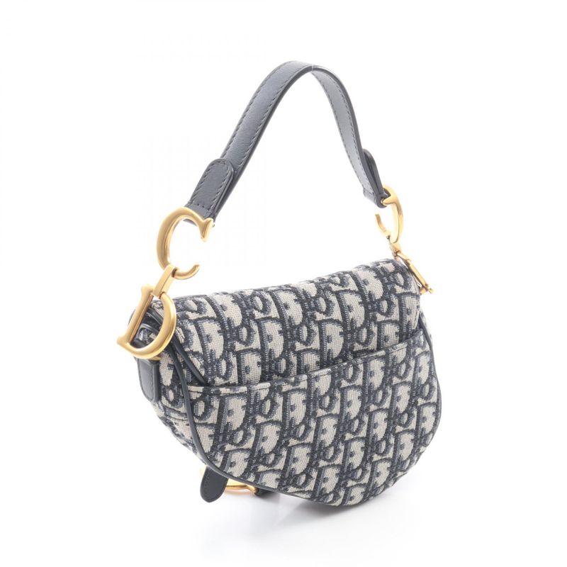 Dior Saddle Bag Mini Oblique Peacock Navy Canvas Leather Ivory. Navy. Black