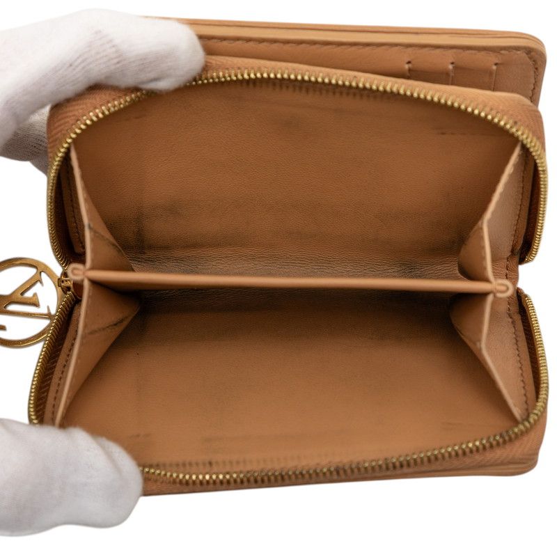 Louis Vuitton Monogram Embossed Portefeuille Camel Brown Lamb Leather