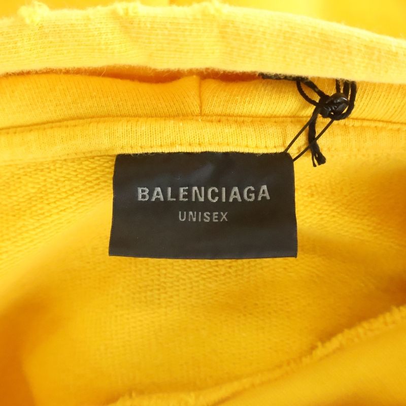 Balenciaga Distressed Logo Print Cotton Jersey Hoodie Yellow