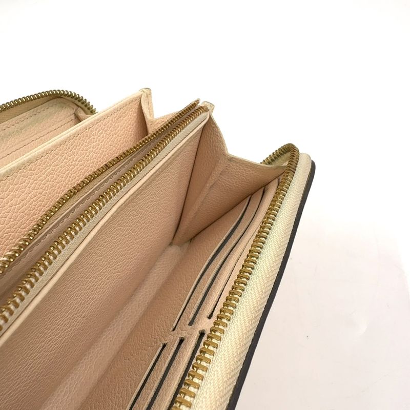 Louis Vuitton Zippy Wallet Monogram Giant Empreinte Leather Light Yellow