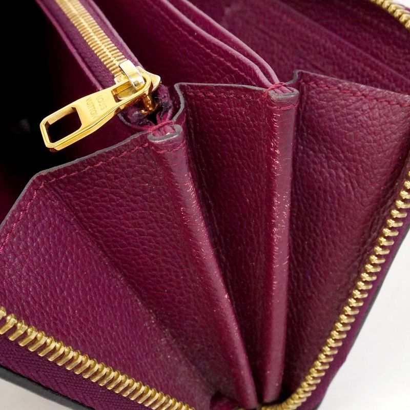 Louis Vuitton Wallet Monogram Empreinte Zippy Leather Raisin