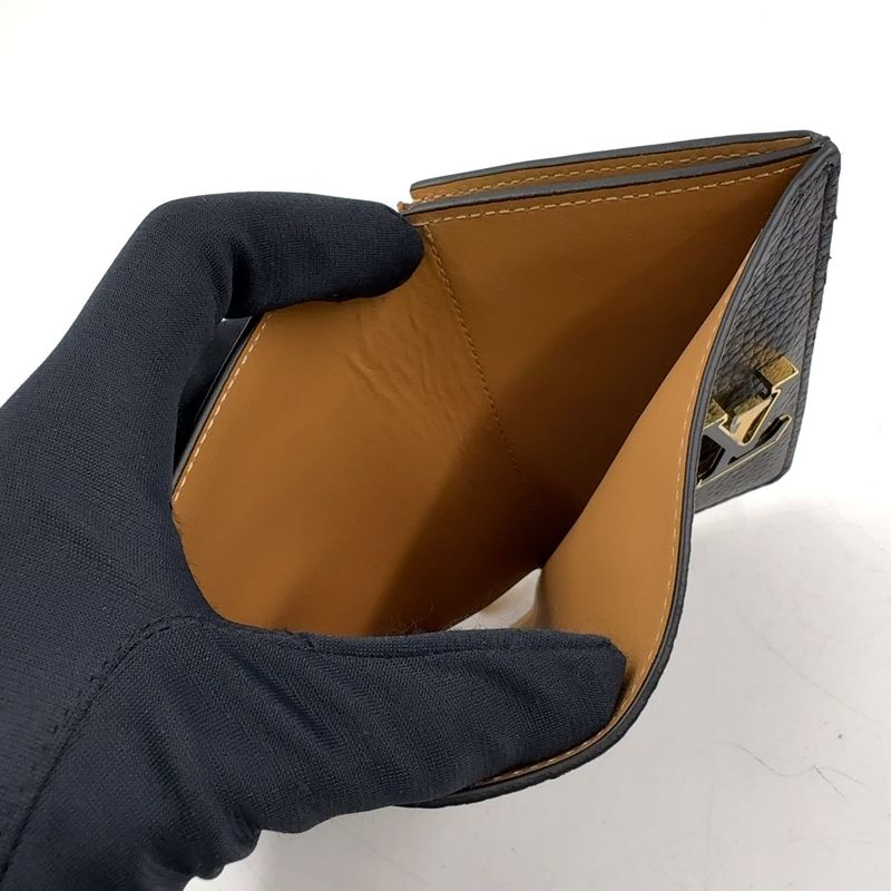 Louis Vuitton Vertical Wallet Leather Brown Black Gold