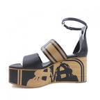 Hermes Charis Bride de Gala Cadri Tattoo Sandals Black Brown