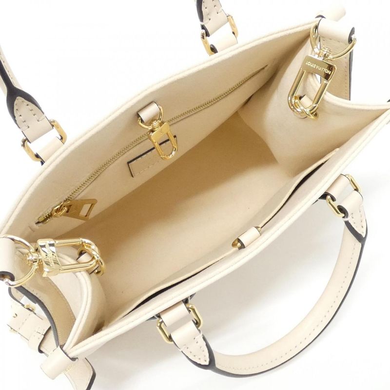 Louis Vuitton Monogram Empreinte on the Go PM Bag Creme