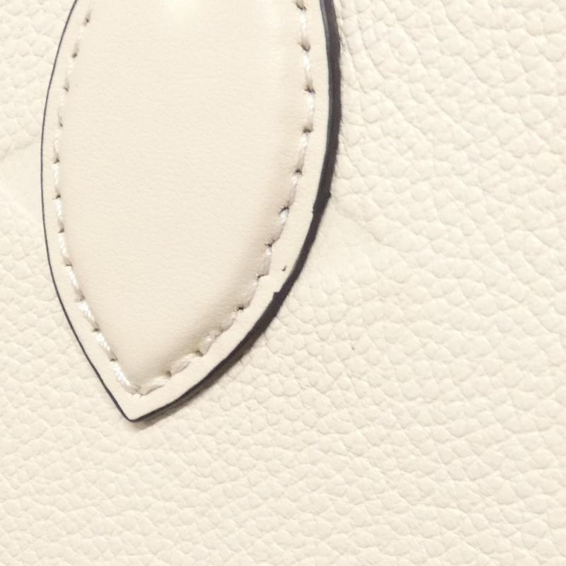 Louis Vuitton Monogram Empreinte on the Go PM Bag Creme