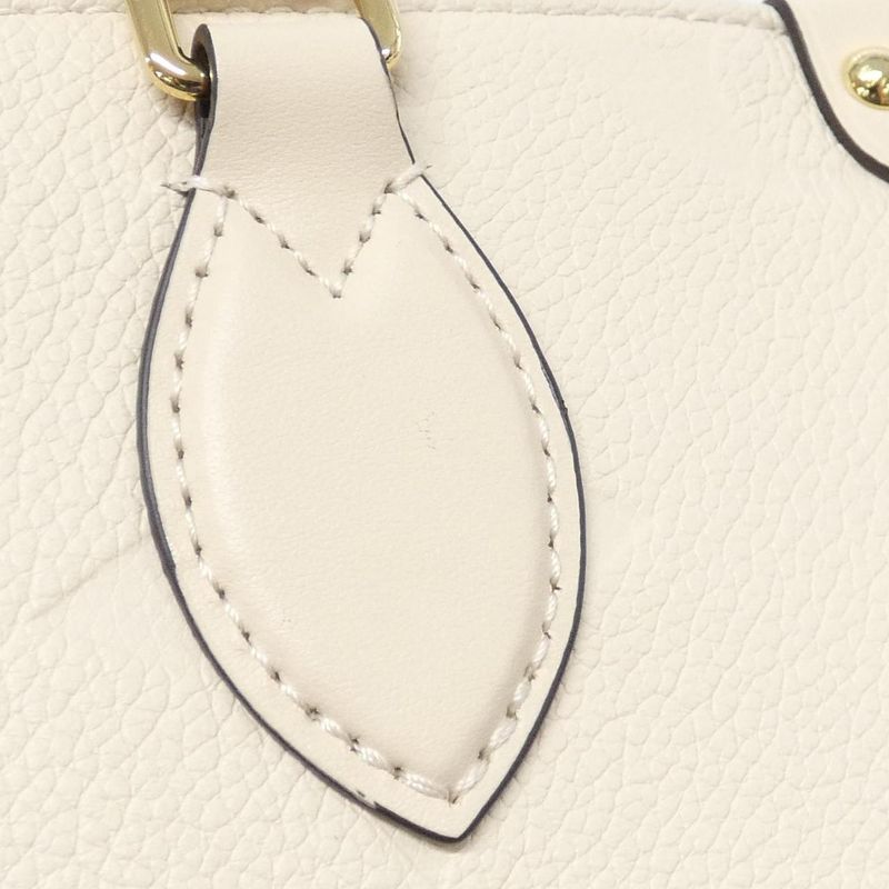 Louis Vuitton Monogram Empreinte on the Go PM Bag Creme