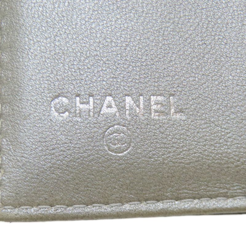 Chanel Camellia Embossed Silver Bifold Wallet