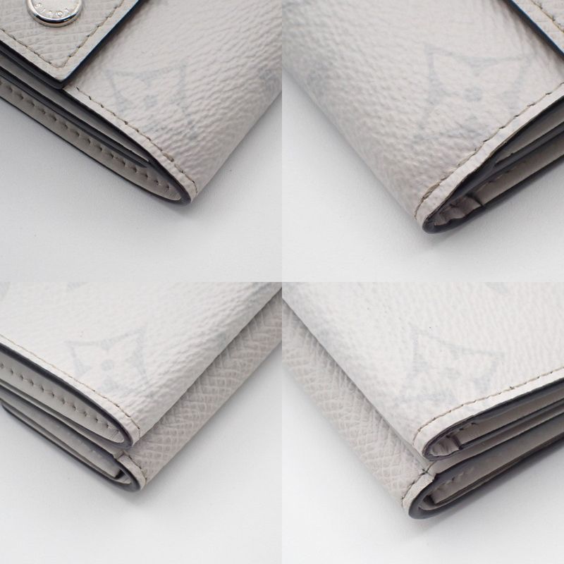 Louis Vuitton Discovery Compact Wallet Taigarama White Leather