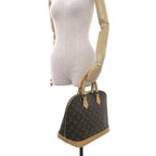 Louis Vuitton Monogram Alma Handbag — view 9