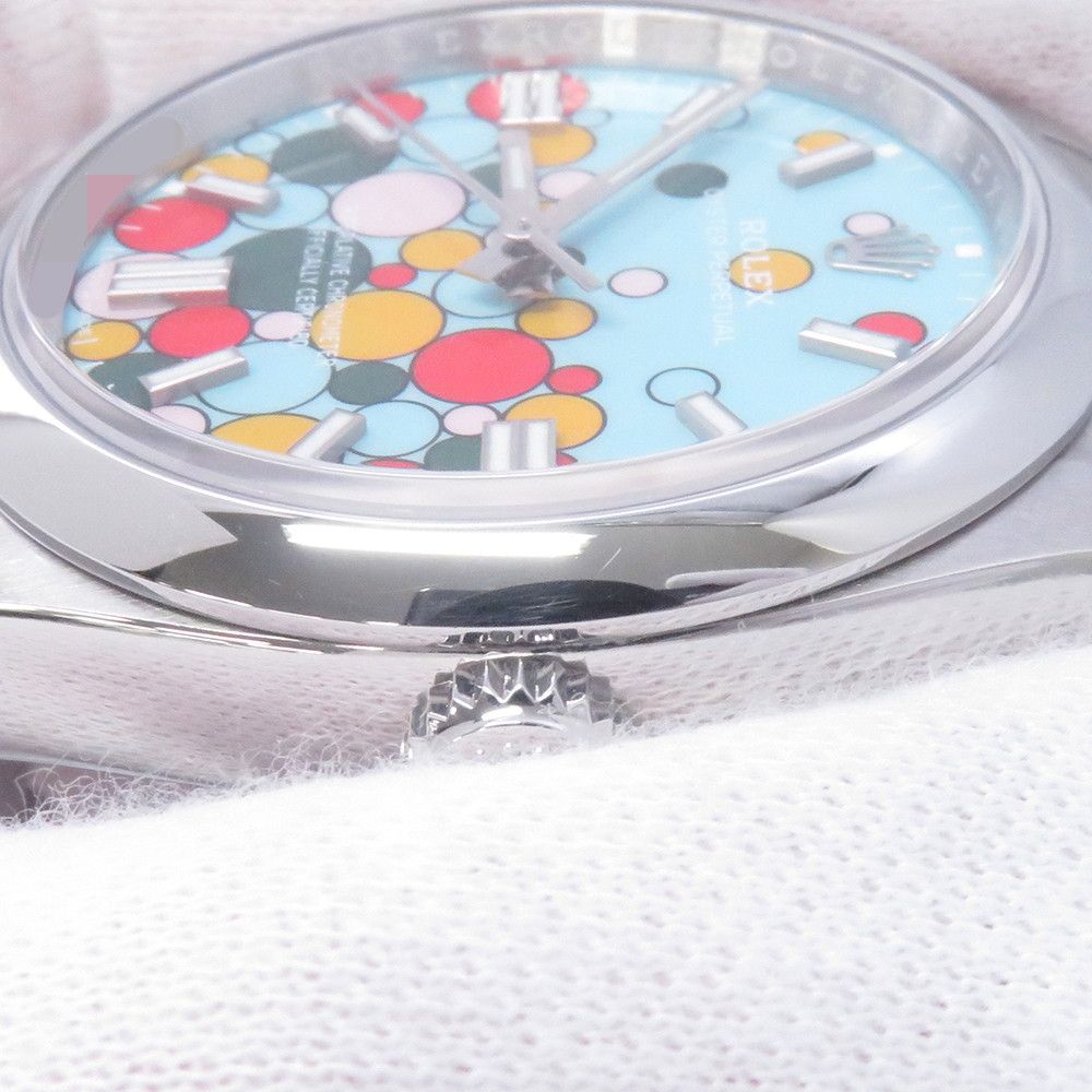 Rolex Oyster Perpetual 36 Watch Turquoise Blue Celebration Dial — view 4