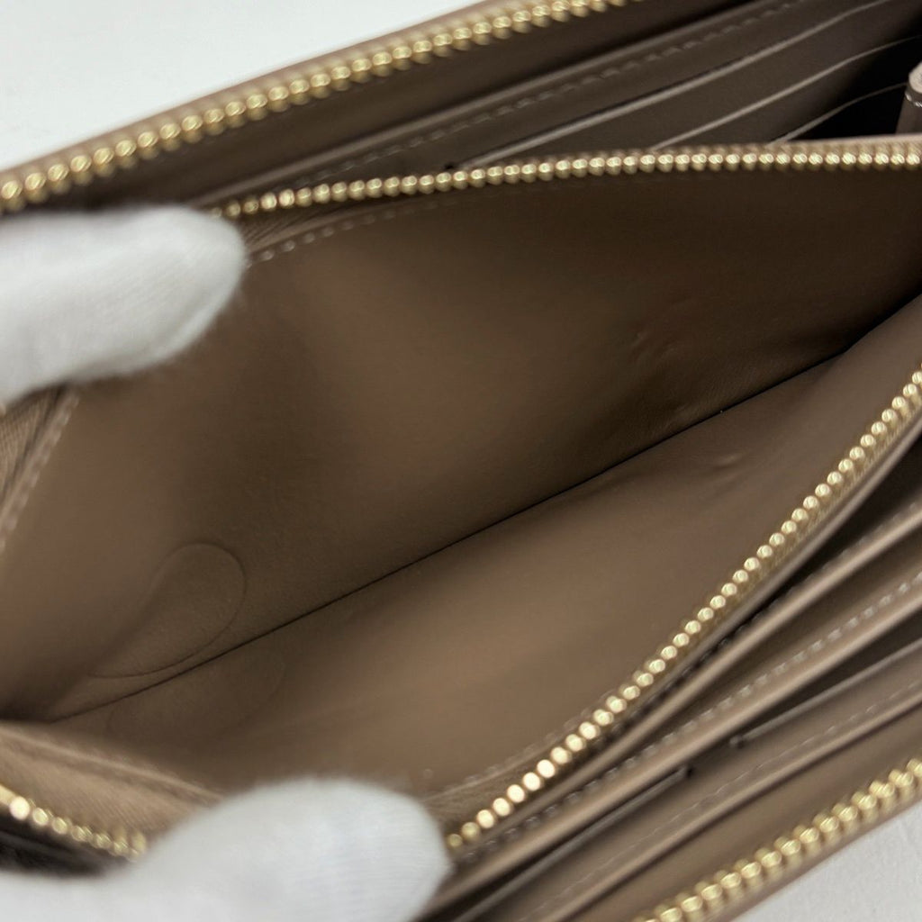 Louis Vuitton Zippy Wallet Coussin Embossed Monogram Leather Taupe — view 7