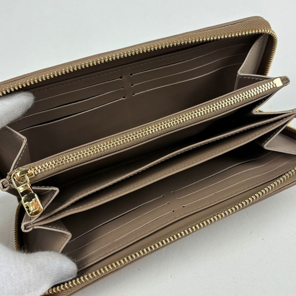 Louis Vuitton Zippy Wallet Coussin Embossed Monogram Leather Taupe — view 8