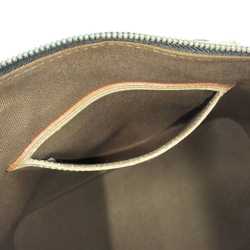 Louis Vuitton Alma Handbag Monogram — view 8