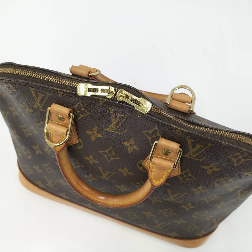 Louis Vuitton Alma Handbag Monogram — view 7