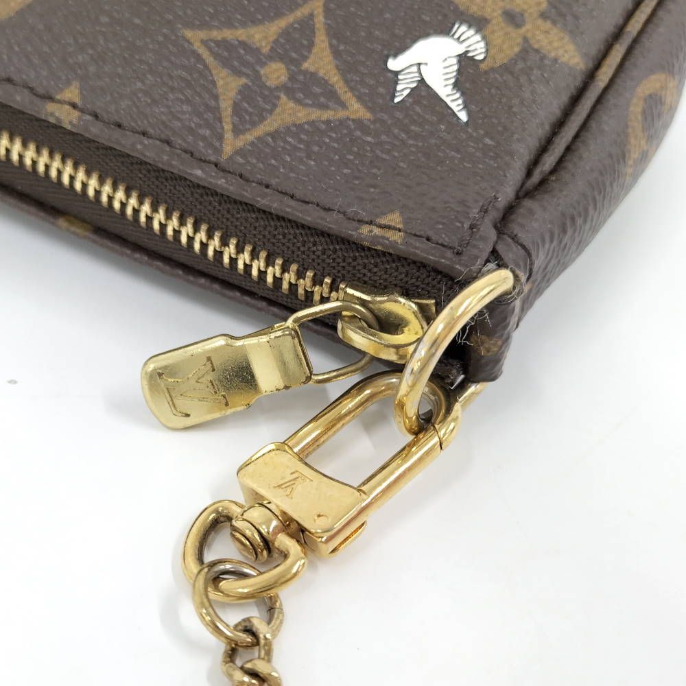 Louis Vuitton Mini Pochette Accessoire Illust Evasion Pouch Monogram — view 7