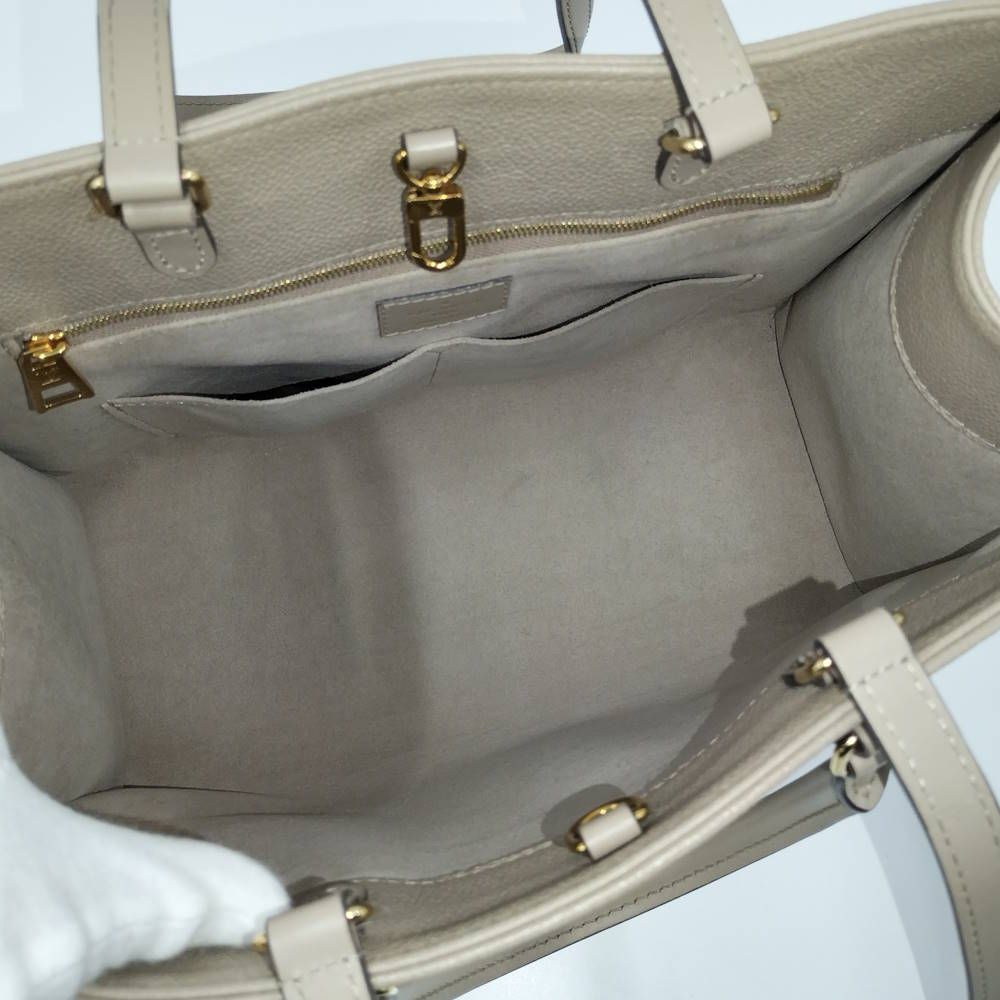 Louis Vuitton On The Go MM 2-Way Shoulder Bag Monogram Empreinte Tourterelle — view 9
