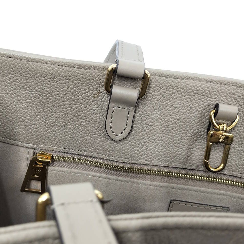 Louis Vuitton On The Go MM 2-Way Shoulder Bag Monogram Empreinte Tourterelle — view 8