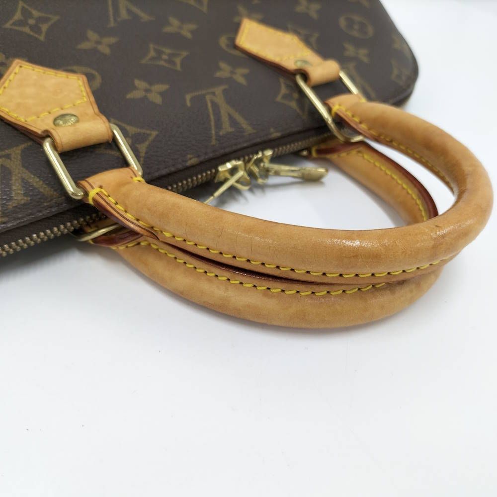 Louis Vuitton Alma Handbag Monogram — view 7