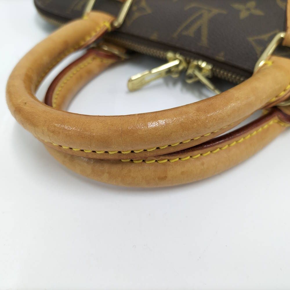 Louis Vuitton Alma Handbag Monogram — view 8