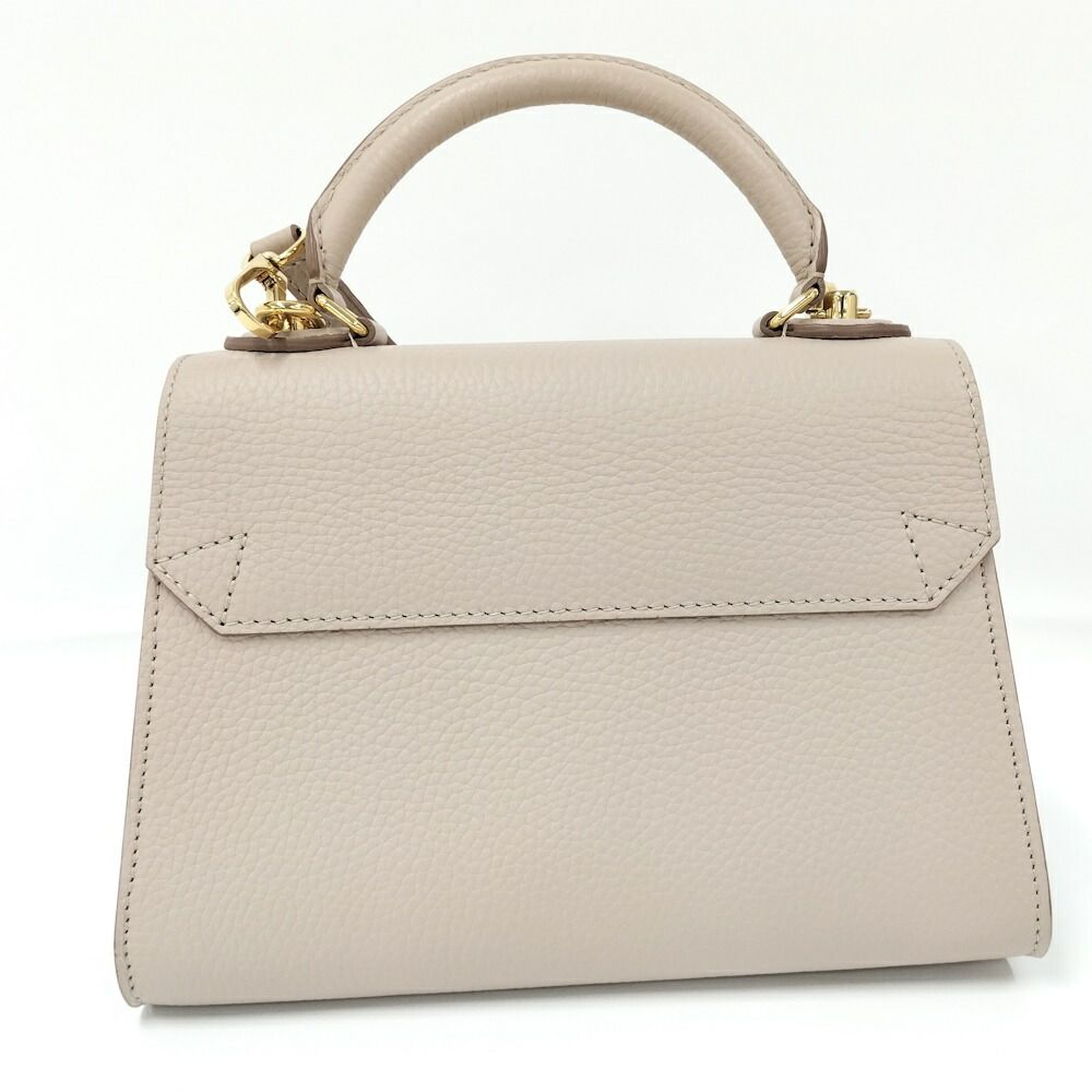 Louis Vuitton Logo Twist One Handle PM 2-Way Shoulder Bag — view 2