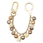 Louis Vuitton Porte Cles Chenne Pastille Key Holder Charm Gold Brown Plated — view 2
