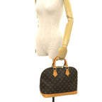 Louis Vuitton Monogram Alma Handbag — view 9